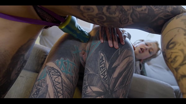 Burlesque tattoo beauty with big boobs gives anal fuck with strap-on